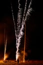 Long exposure of people letting off fireworks Royalty Free Stock Photo