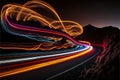 a long exposure photo of a highway with light streaks on it\'s side and a mountain in the background Royalty Free Stock Photo