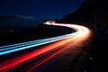 Long exposure photo of highway at night with light streaks. Generative AI Royalty Free Stock Photo