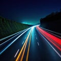 long exposure photo of highway at night with light streaks on the side of the Royalty Free Stock Photo