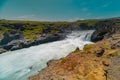 Long exposure photo of magnificent Godafoss waterfall in northern Iceland on a warm summer day. Visible frog from drops of water