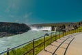 Long exposure photo of magnificent Godafoss waterfall in northern Iceland on a warm summer day. Visible frog from drops of water