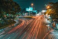 long exposure photo of a busy intersection in the night with many light streaks Royalty Free Stock Photo