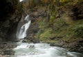 Long exposure photograph of Cascada Del Estrecho Estrecho waterfall in Ordesa valley, in Autumn season
