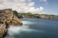 Long exposure photograph sea water hitting the volcanic rock on Bali Island Royalty Free Stock Photo