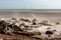 Looking out over the ocean at Pett Level Beach, with long exposure