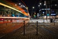 Long exposure photography capturing a tram passing by creating stunning, colorful ghost lines in Milan