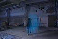 Dancing with a Ghost in the darkindustrial building