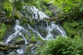 Long Exposure Photography Waterfall in Lush Forest by the Old Water Mill Royalty Free Stock Photo