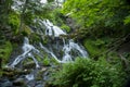 Long Exposure Photography Waterfall in Lush Forest by the Old Water Mill Royalty Free Stock Photo