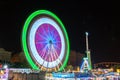 Long exposure picture of lighted ferris wheel in motion at the amusement park in Valencia at night Royalty Free Stock Photo