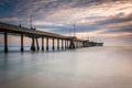 Long exposure of the pier at sunset, in Venice Beach Royalty Free Stock Photo