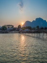 Sun setting on Nam Song River, Laos Royalty Free Stock Photo