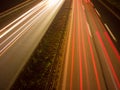 Long exposure road traffic night lights spotlight Royalty Free Stock Photo