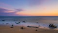 Long exposure seascape and passing clouds at sunrise Royalty Free Stock Photo