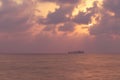 Long exposure of a ship sailed on the horizon of the Sea of ashkelon, Israel. Royalty Free Stock Photo