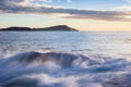 Long exposure shot of a beautiful ocean at sunrise Royalty Free Stock Photo