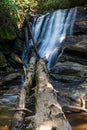 Long exposure shot of a beautiful waterfall flowing down the rocks Royalty Free Stock Photo