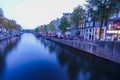 Long exposure shot of canal side dutch architecture Royalty Free Stock Photo