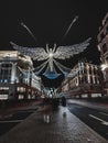 Long exposure shot of Christmas decoration lights on the Oxford street in London.