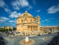 Long exposure shot about the famous Mosta Dome with moving clouds at daylight - Malta