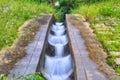 Long exposure shot of a man-made waterfall Royalty Free Stock Photo