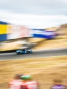 Long-exposure shot of NASCAR driver Ross Chastain on the road at Sonoma