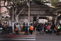 Long exposure shot of people and school kids rushing to school in front of the entrance in Shanghai