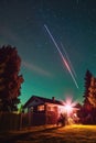 long exposure shot of a satellite passing over