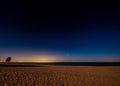 Chicago lights in the distance over Lake Michigan