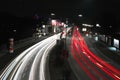 Long exposure shot of a street at night with illuminating lights in Vienna Royalty Free Stock Photo