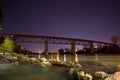 Night shot of train trestle over Sacramento River in Redding, CA Royalty Free Stock Photo