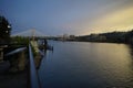 Long exposure shot of Tilikum Bridge near OMSI, East side Portland Oregon under a clear blue sky