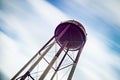 Long exposure sky and clouds with water tower Royalty Free Stock Photo