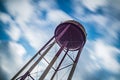 Long exposure sky and clouds with water tower Royalty Free Stock Photo