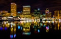 Long exposure of the skyline at night, from the Inner Harbor in Royalty Free Stock Photo