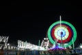 Long Exposure slow shutter speed Shot of a Spinning Ferris Wheel with beautiful lights in indian Fun Fair at night Royalty Free Stock Photo