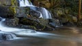 Long exposure of a small rocky cascade Royalty Free Stock Photo