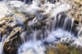 long exposure in a small waterfall in a mountain river of fresh and pure waters Royalty Free Stock Photo