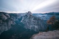 Long exposure of sunrise clouds climbing over Half Dome Royalty Free Stock Photo