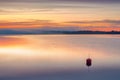 Long Exposure of Sunrise at the Paijanne lake. Morning on the lake. Beautiful scape with sunrise sky,fog, pine forest and water. Royalty Free Stock Photo