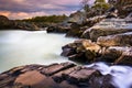 Long exposure at sunset of rapids at Great Falls Park, Virginia. Royalty Free Stock Photo