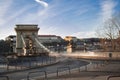 Long exposure in the sunshine. Cars drive fast over the Chain Bridge on the banks of the Danube in Budapest Royalty Free Stock Photo