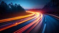 Long exposure of traffic lights on highway at dusk Royalty Free Stock Photo