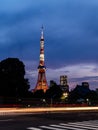 A long exposure of traffic passing by Tokyo tower at night Royalty Free Stock Photo