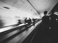 Long exposure of unrecognizable of commuters inside Parisian underground metro