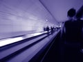 Long exposure of unrecognizable of commuters inside Parisian underground metro