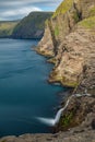 Bosdalafossur waterfall vertical composition long exposure, Faroe Islands Royalty Free Stock Photo