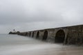 Long exposure view of the breakwater walk in the bikinis beach