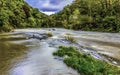 A long exposure view from Cenarth up the river Teifi, Wales after heavy rainfall Royalty Free Stock Photo